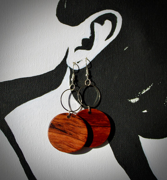 Handcrafted exotic guitar wood earrings.