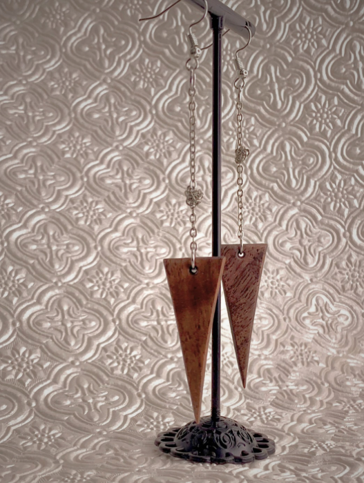 Tangled Chains attached to wood spikes. Martin guitar exotic guitar wood earrings.
