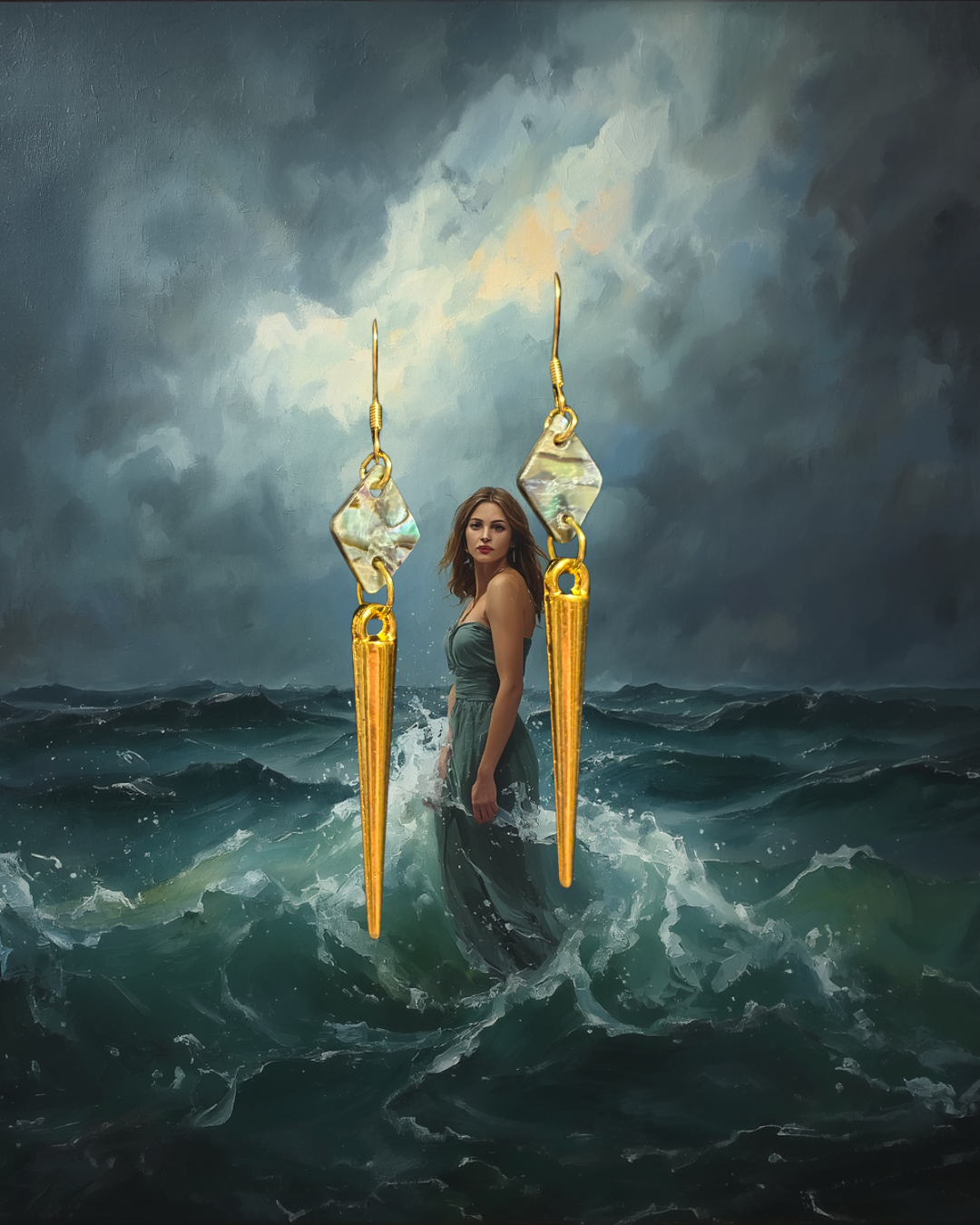 Earrings with a gold and green design against a stormy ocean background