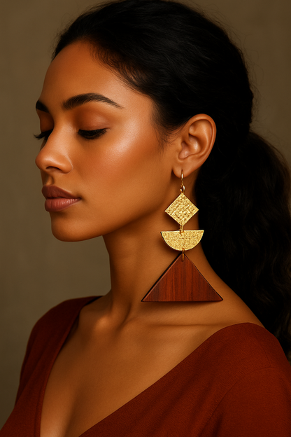 Egyptian Woman wearing hammered gold earrings with Cocobolo Triangle sourced from Martin Guitar Factory.